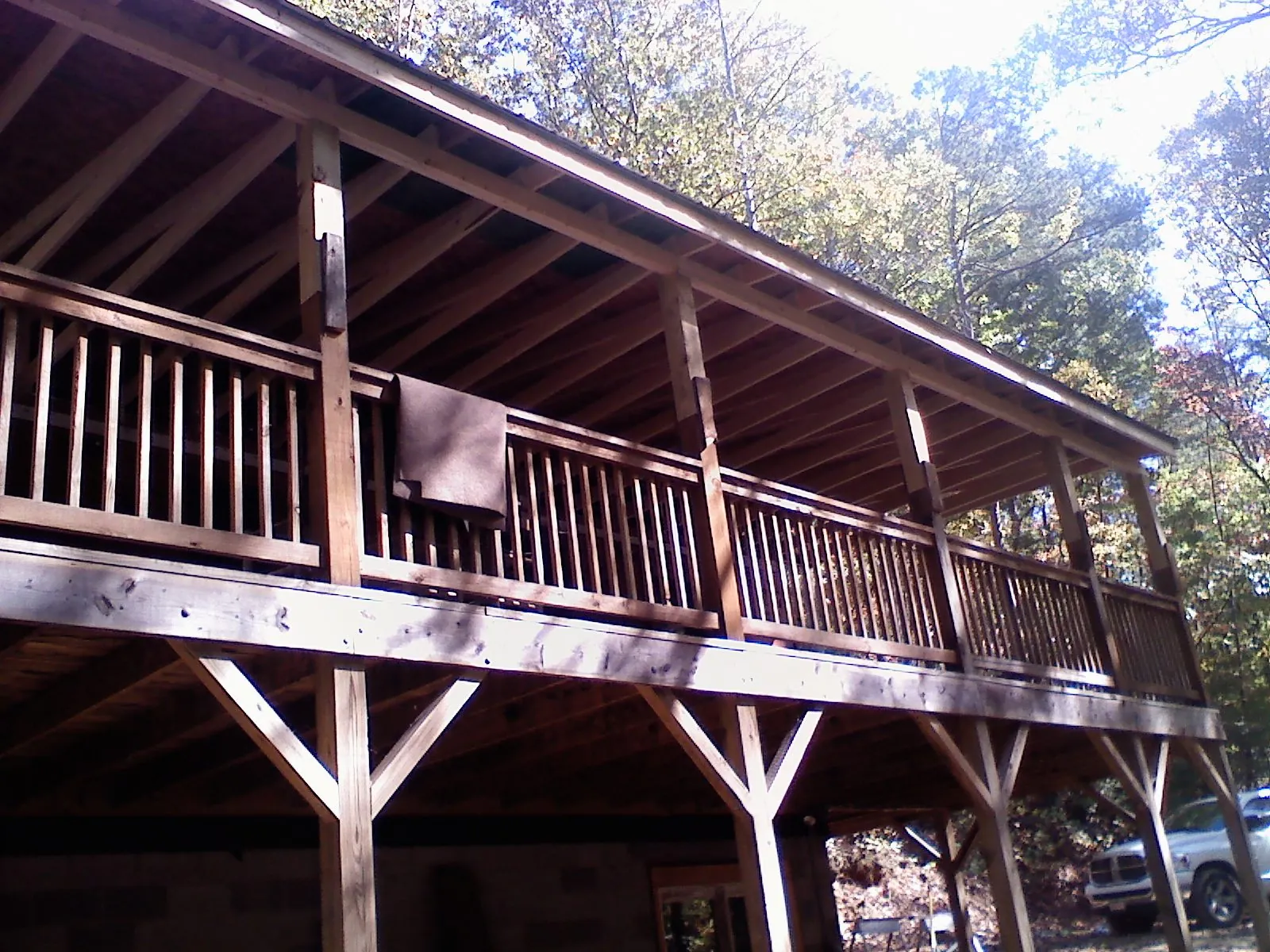 Timber framing under a new elevated porch and deck — Roof Leak Repair in Brookville by Roofing Brothers